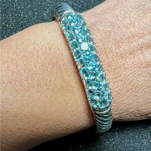 Vintage stainless steel Bracelet, with Blue Topaz, cuff/hinges closure.